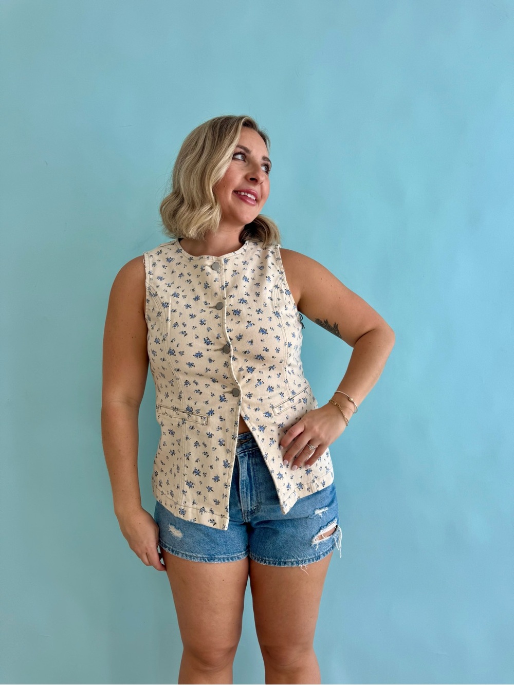 Sleeveless Cream Floral Button-Front Top